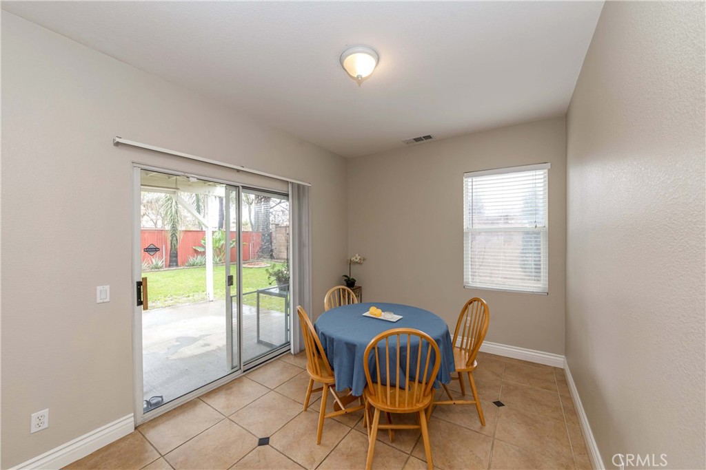 9220 Village Way Riverside, CA 92508 - Photo 12 of 73 a dining room with furniture and window