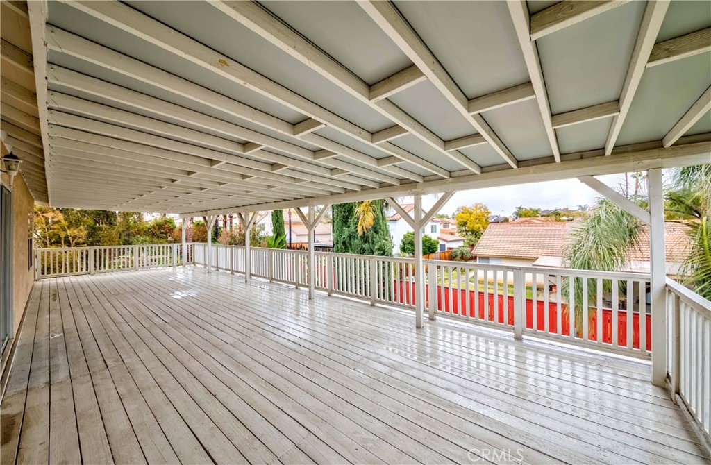 9220 Village Way Riverside, CA 92508 - Photo 29 of 73 a view of a balcony with wooden floor