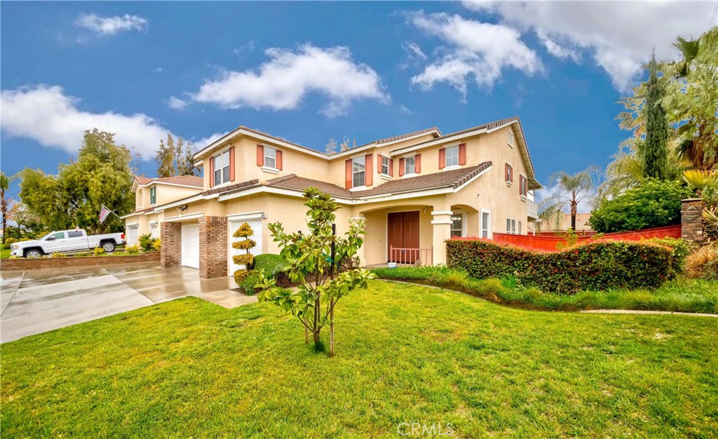 9220 Village Way Riverside, CA 92508 - Photo 64 of 73 a front view of a house with a yard