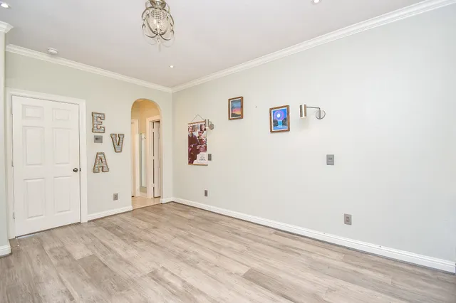a view of an empty room with shelves