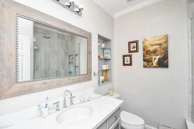 a bathroom with a shower and a tub