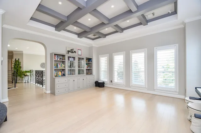 a view of an empty room with a balcony