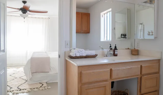 a bathroom with a sink and a mirror