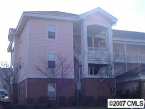 9070 Meadow Vista Road Charlotte, NC 28213 - Photo 1 of 8 a front view of a house with a yard