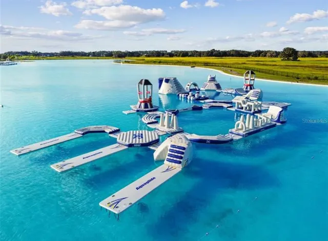 a view of a swimming pool and an ocean
