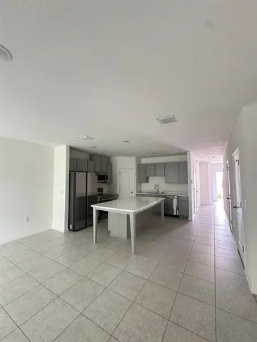 a view of a livingroom with furniture and window