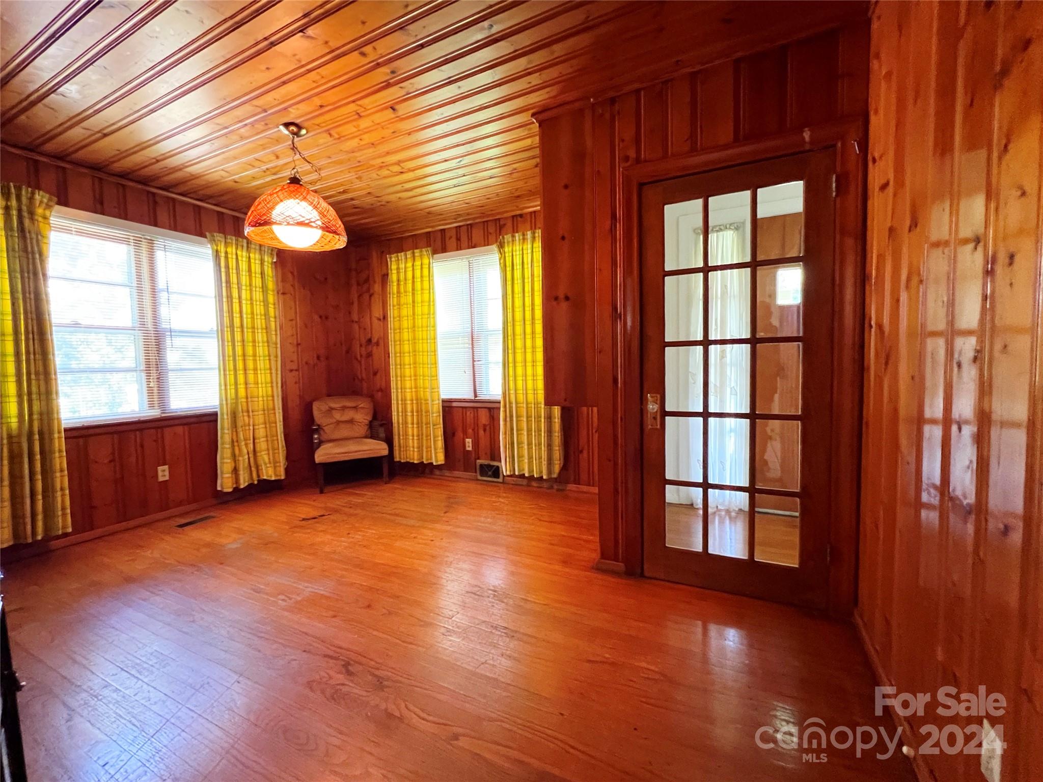 102 Steakhouse Road Morganton, NC 28655 - Photo 18 of 39 an empty room with windows and closet
