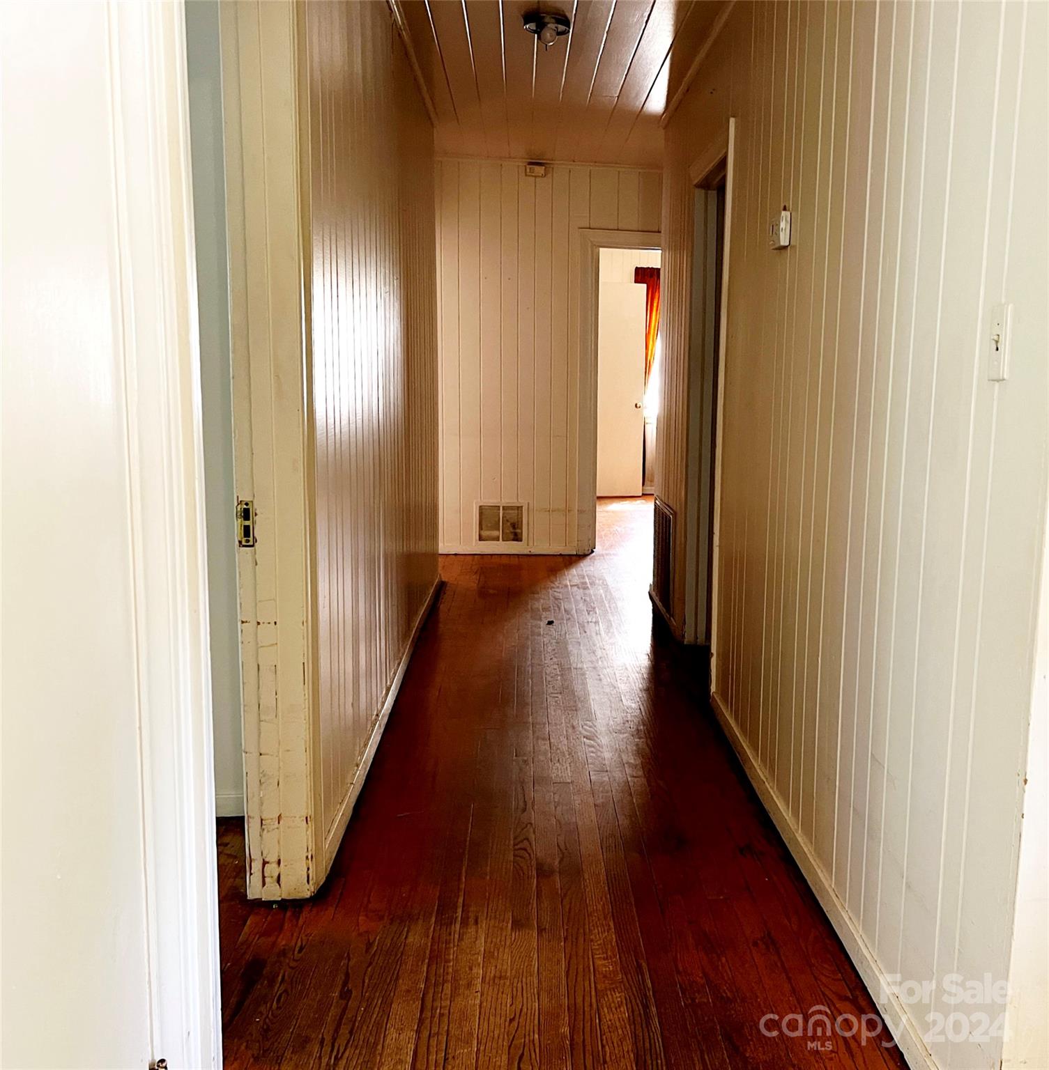 102 Steakhouse Road Morganton, NC 28655 - Photo 20 of 39 a view of a hallway with wooden floor