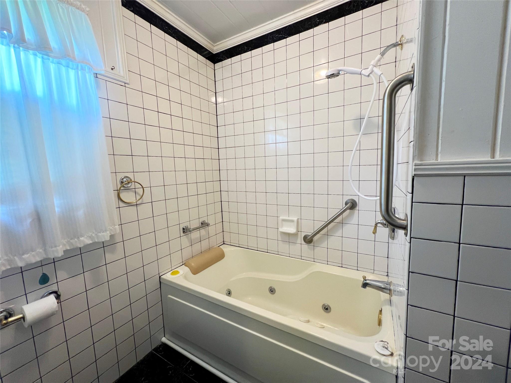 102 Steakhouse Road Morganton, NC 28655 - Photo 26 of 39 a bathroom with a bathtub and shower