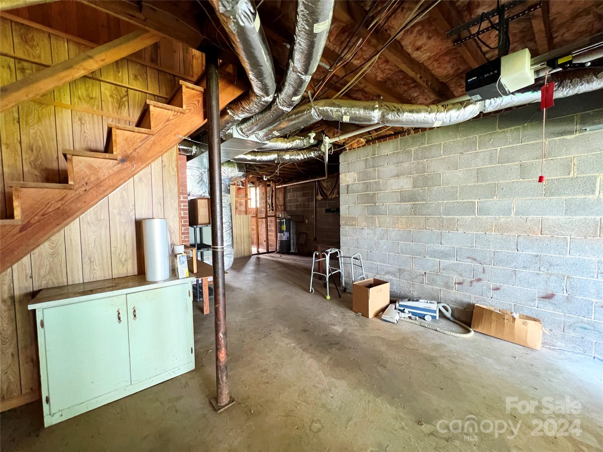 102 Steakhouse Road Morganton, NC 28655 - Photo 34 of 39 a view of a room with wooden shelves
