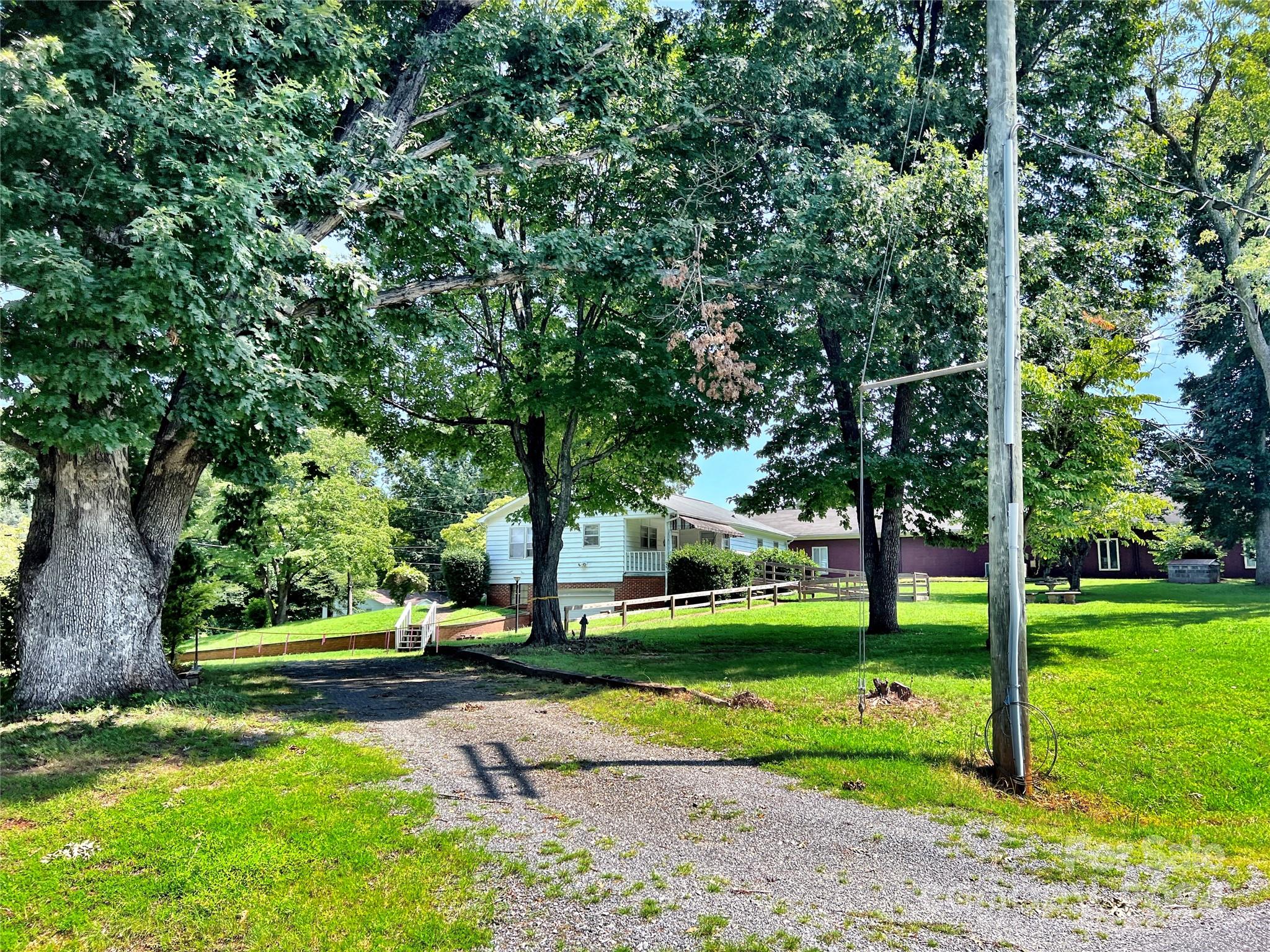 102 Steakhouse Road Morganton, NC 28655 - Photo 5 of 39 a view of a park with tree s