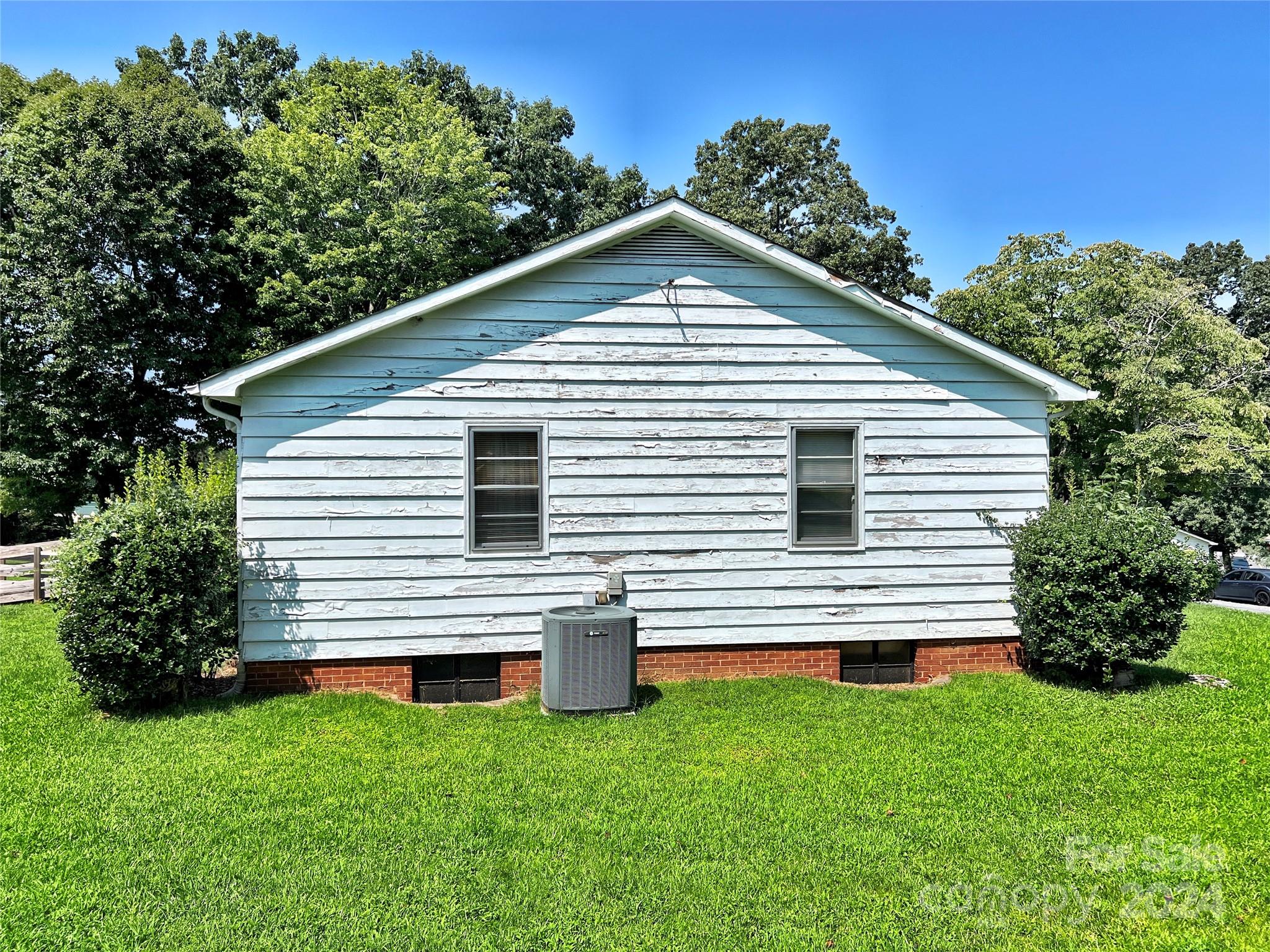 102 Steakhouse Road Morganton, NC 28655 - Photo 9 of 39 a front view of a house with a yard