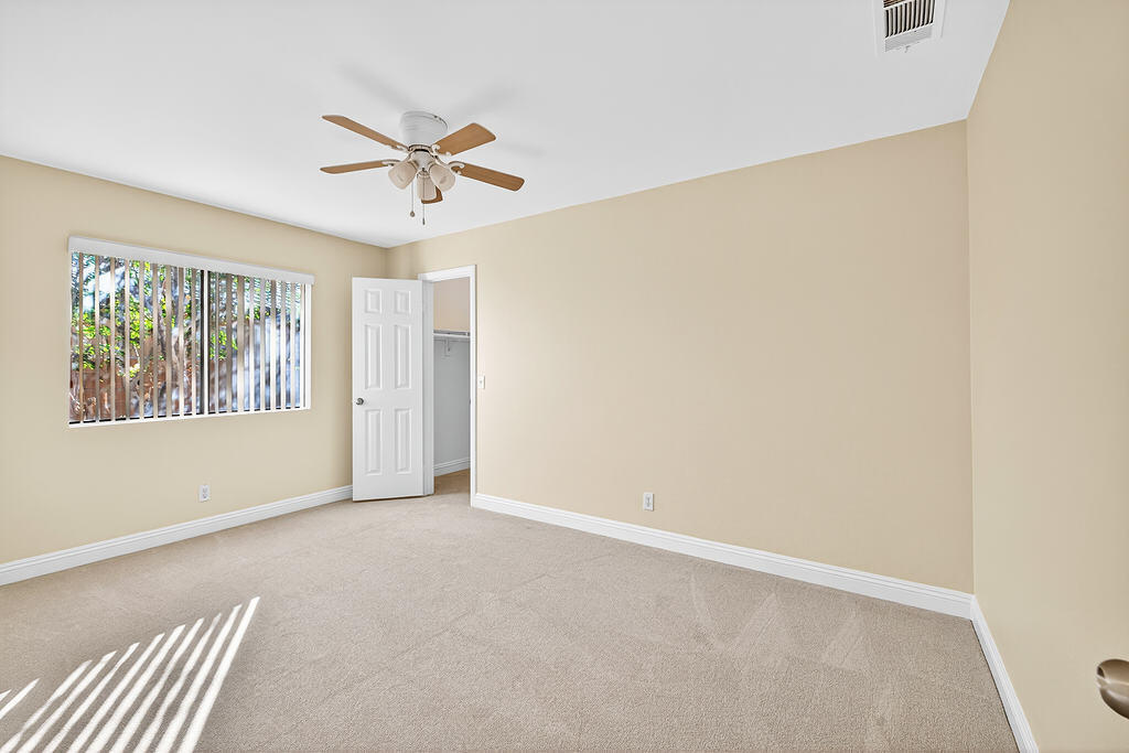 68615 Concepcion Road Cathedral City, CA 92234 - Photo 13 of 25 a view of an empty room with a window