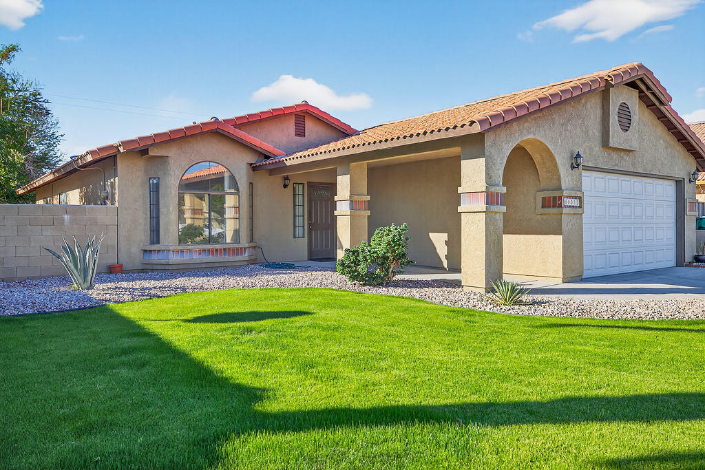 68615 Concepcion Road Cathedral City, CA 92234 - Photo 6 of 25 a front view of a house with a garden