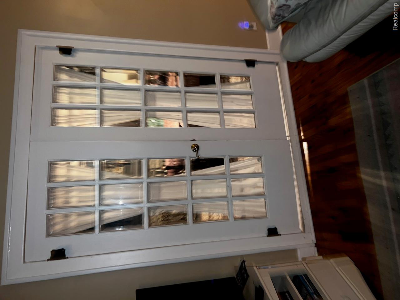 3364 East Pierson Road Flint, MI 48506 - Photo 20 of 67 Doorway to outside with wood finished floors and french doors