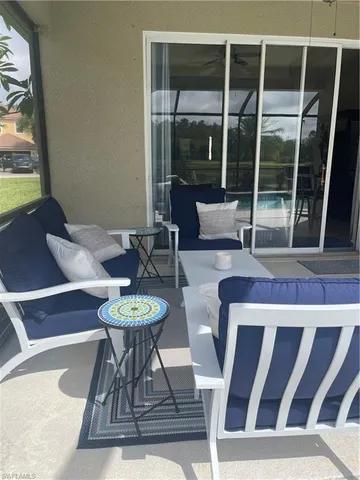 a view of a dining room with furniture wooden floor and a table
