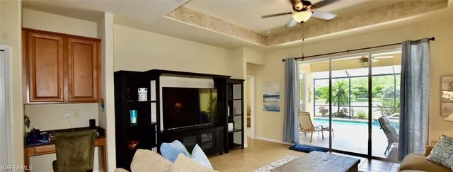 a bedroom with a bed and a large mirror