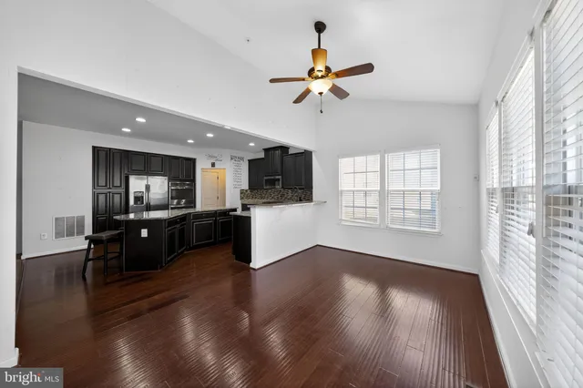 a bedroom with bed and a window