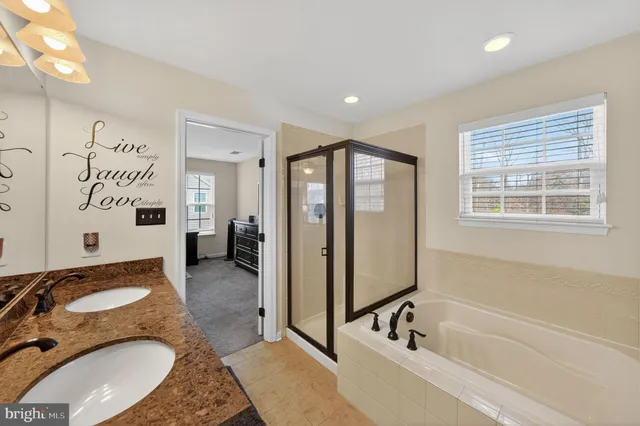 a bathroom with a sink toilet and mirror