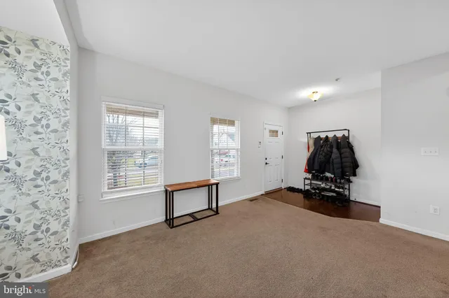 a room with furniture and a window