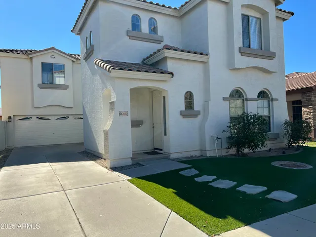 a view of a back yard of the house