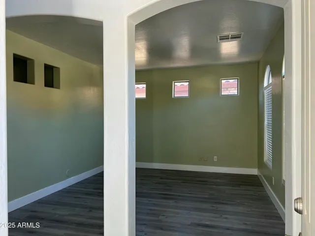 a view of a livingroom with wooden floor