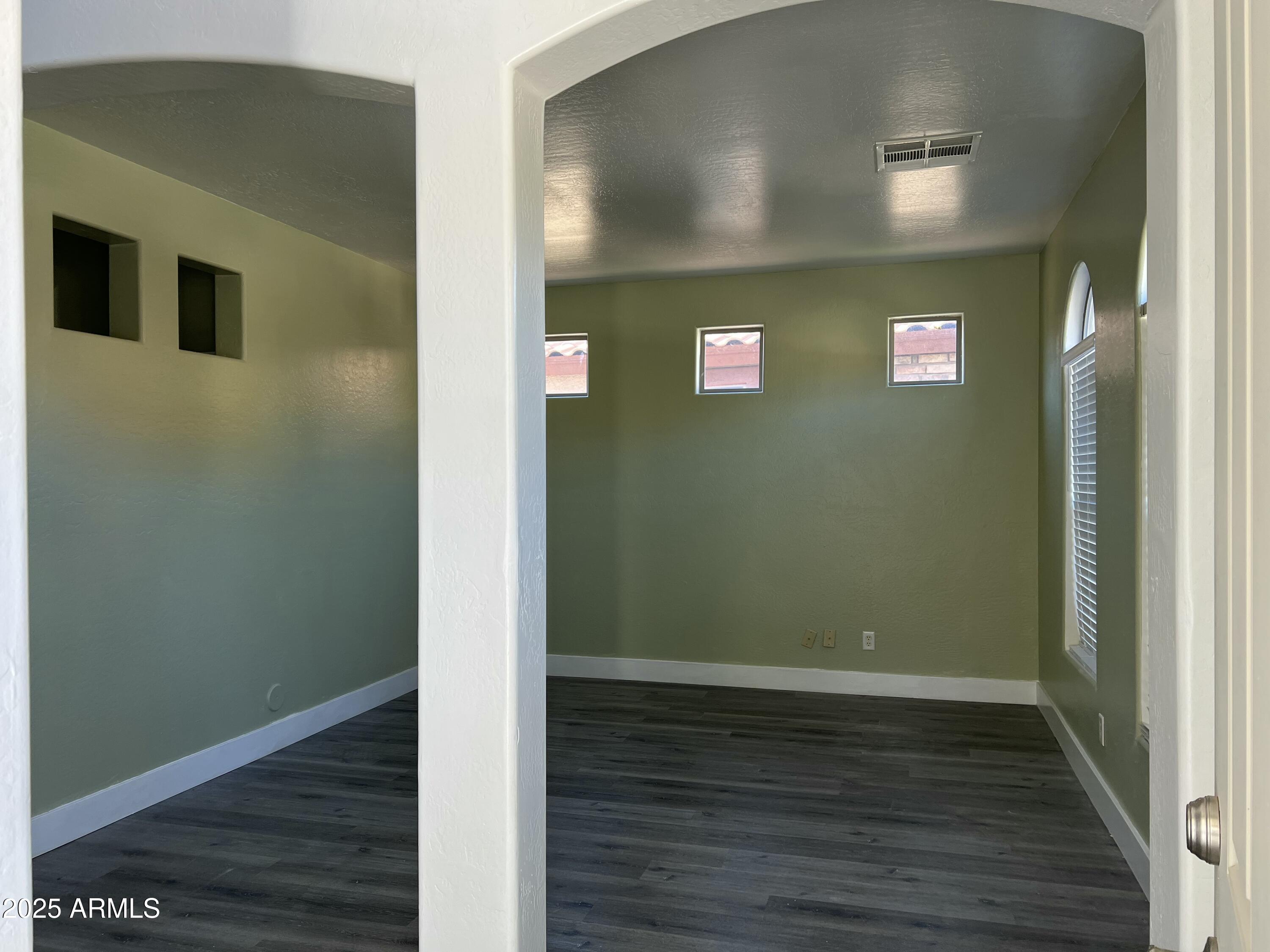 2679 East Chester Drive Chandler, AZ 85286 - Photo 3 of 30 a view of a livingroom with wooden floor