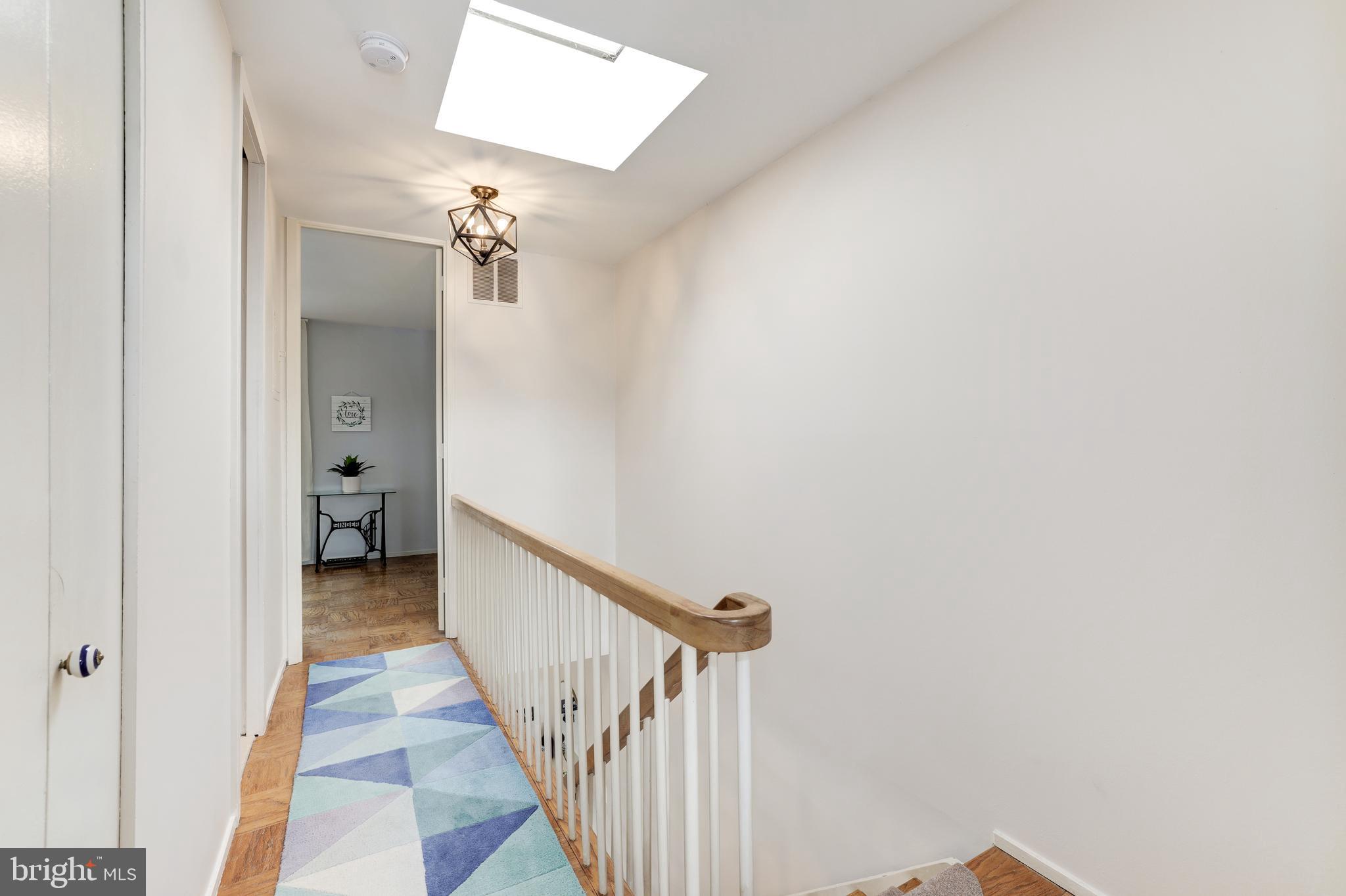 1618 Chimney House Road Reston, VA 20190 - Photo 13 of 30 Upper Level Hallway w/ Skylight