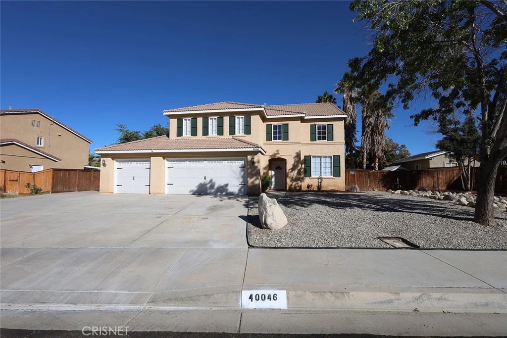 40046 Becky Lane Palmdale, CA 93551 - Photo 23 of 23 a front view of a house with entertaining space
