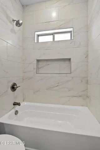 a bathroom with a bathtub