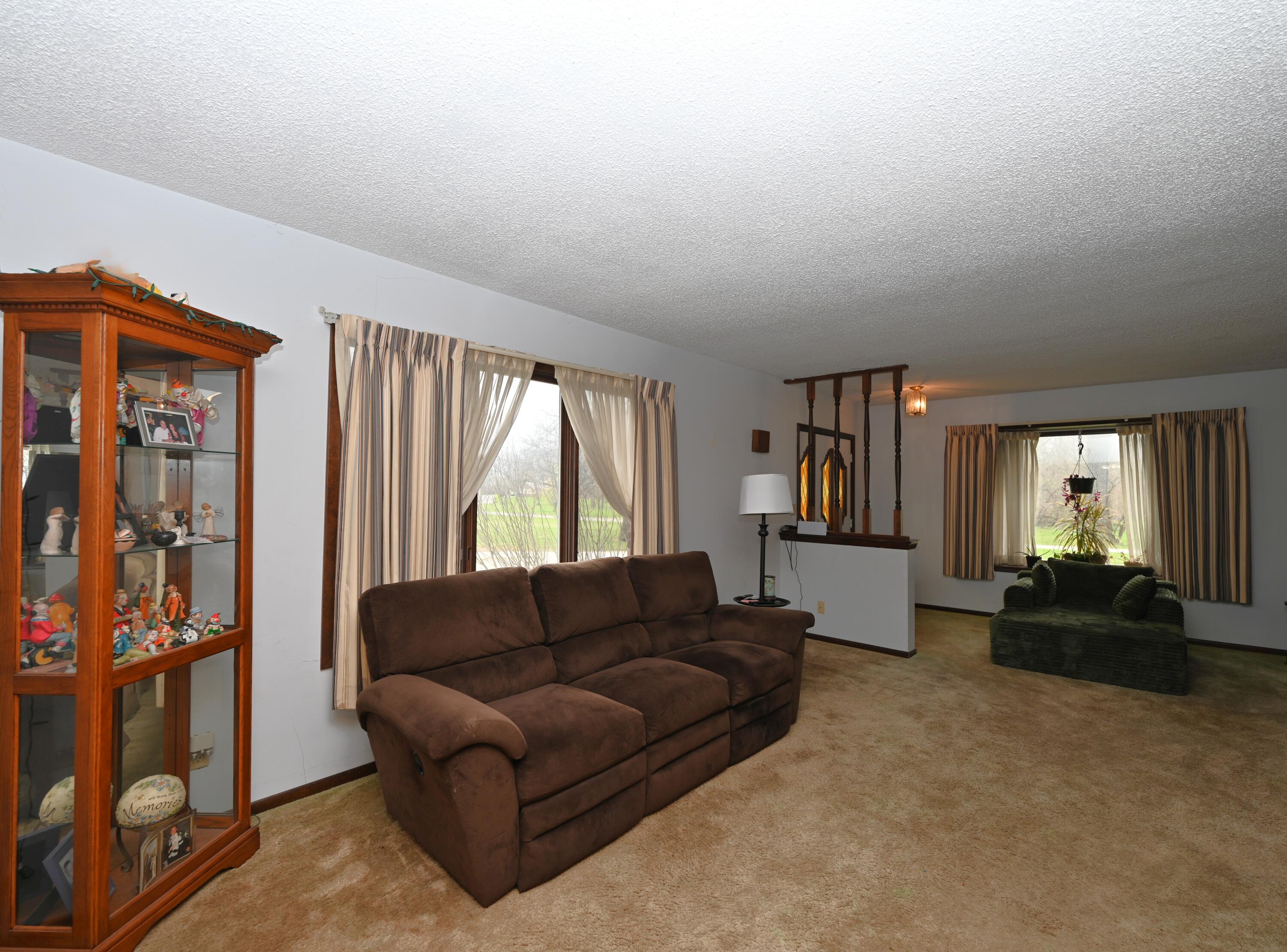 5110 West 400 North Winamac, IN 46996 - Photo 16 of 35 a living room with furniture and a large window