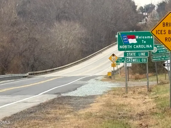 a view of swimming pool with an outdoor seating