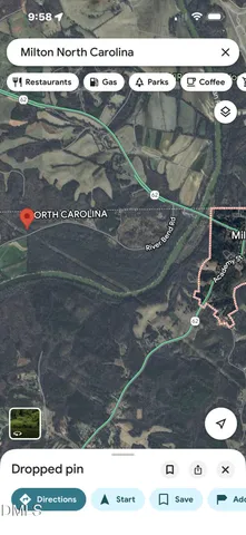 a black and white photo of a bench