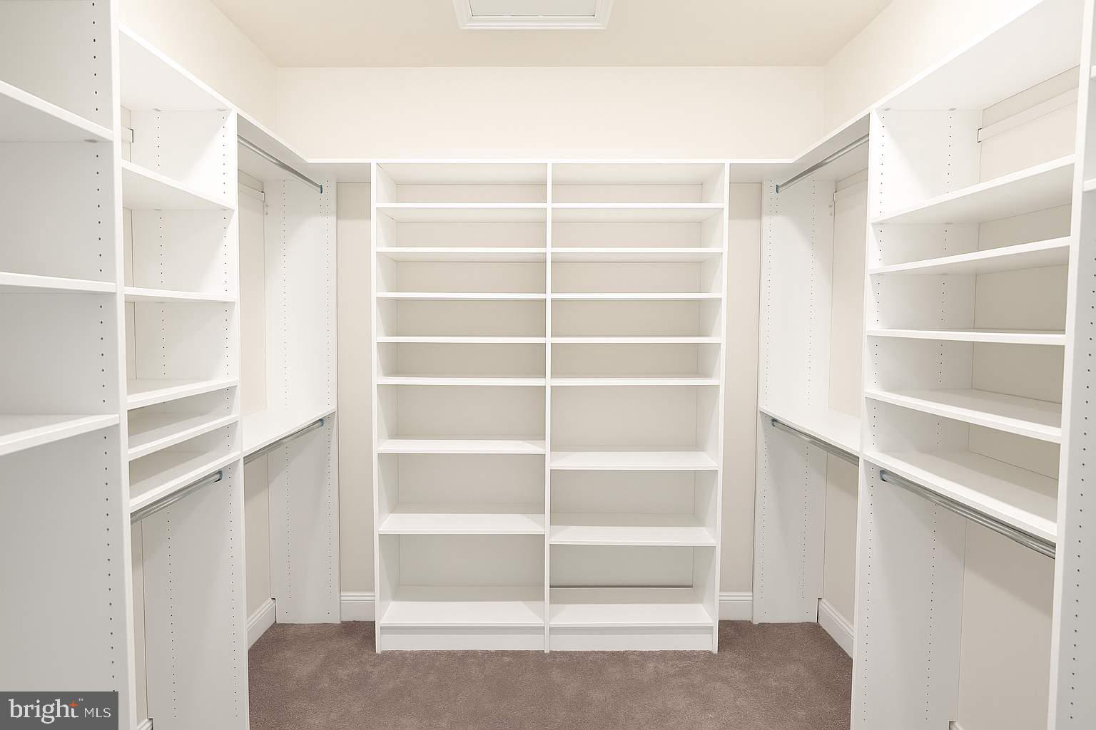 5544 Old Colony Court White Plains, MD 20695 - Photo 12 of 24 a view of room with empty empty racks