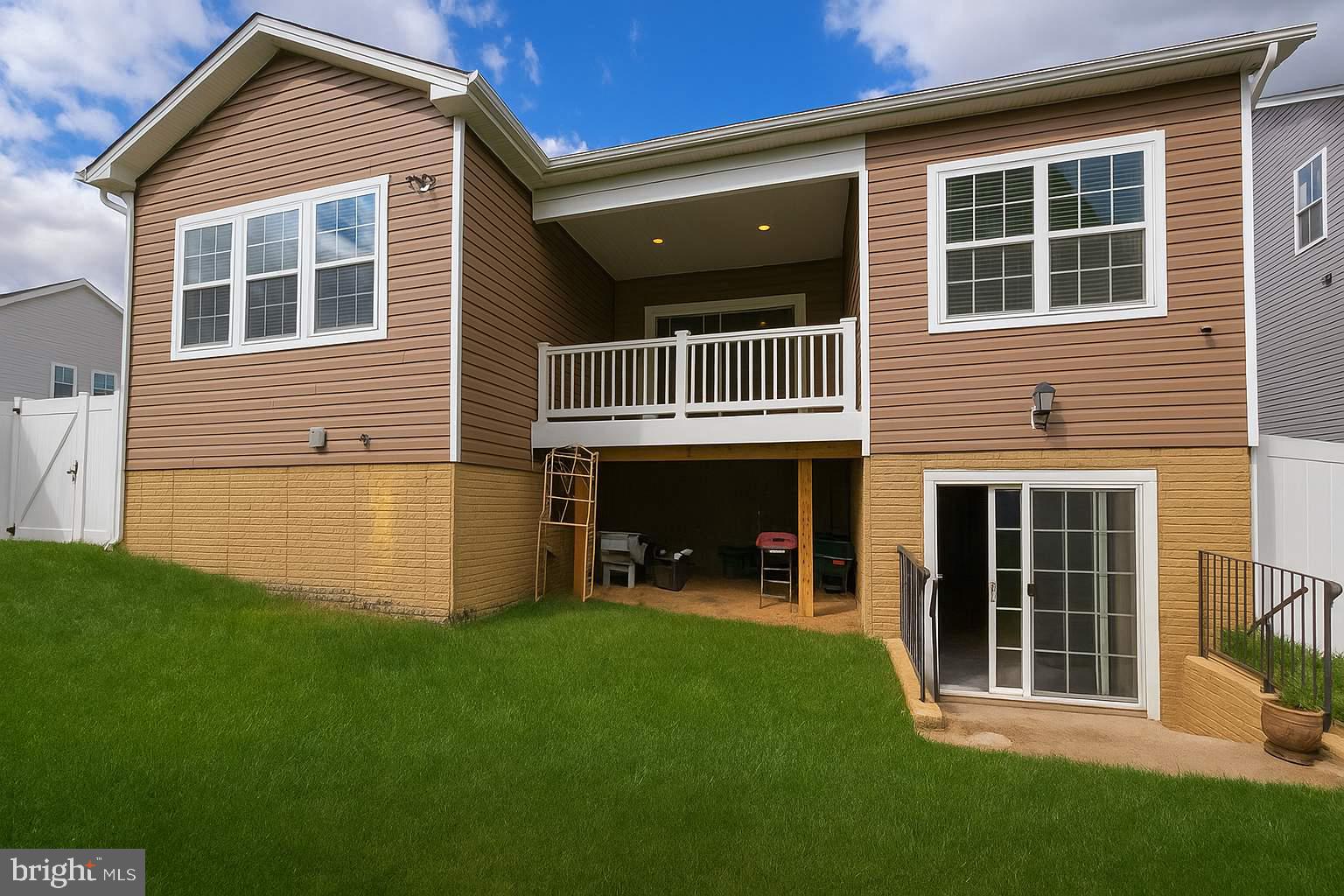 5544 Old Colony Court White Plains, MD 20695 - Photo 2 of 24 a view front of house with a yard