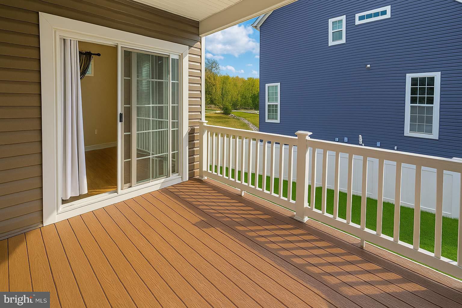 5544 Old Colony Court White Plains, MD 20695 - Photo 3 of 24 a view of a balcony with wooden floor