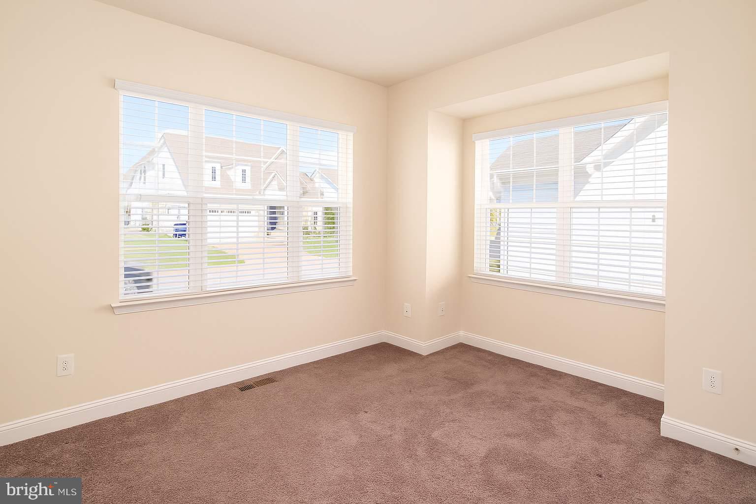 5544 Old Colony Court White Plains, MD 20695 - Photo 10 of 24 a view of an empty room with a window