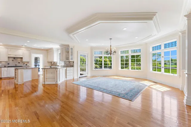 a kitchen with granite countertop a sink and a window