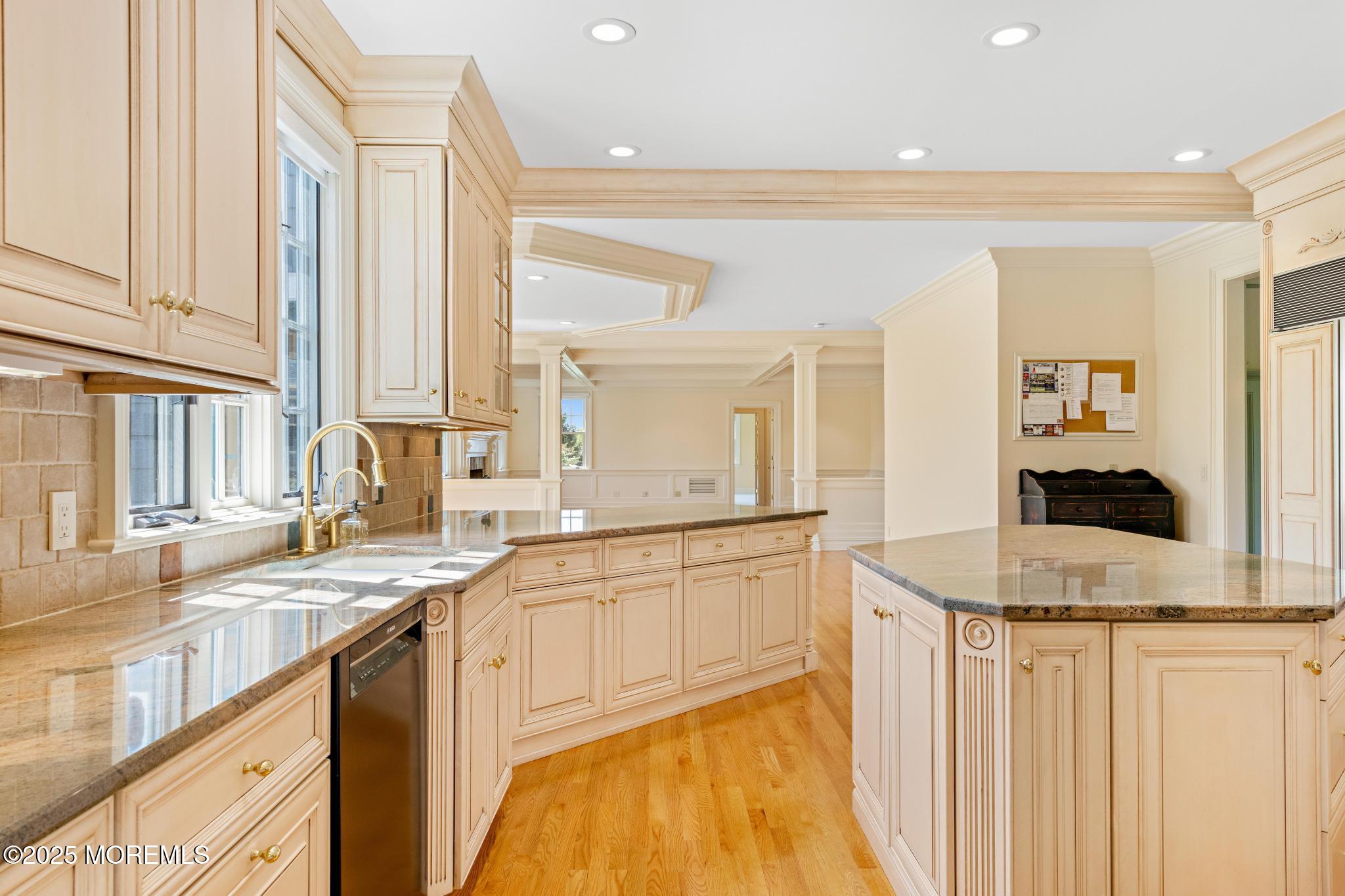 13 Driftwood Lane Colts Neck, NJ 07722 - Photo 16 of 88 a kitchen with stainless steel appliances granite countertop a sink and a white cabinets