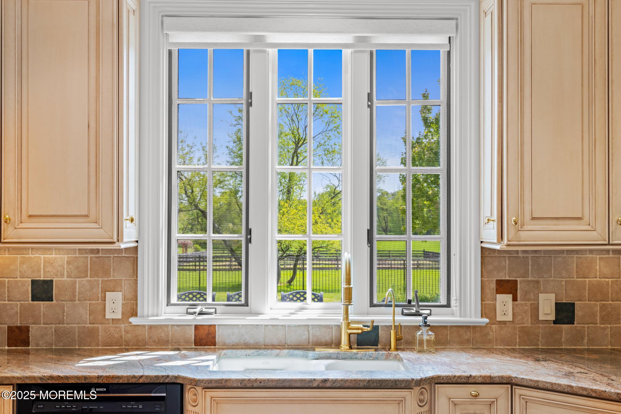 13 Driftwood Lane Colts Neck, NJ 07722 - Photo 17 of 88 a kitchen with granite countertop a sink and a window