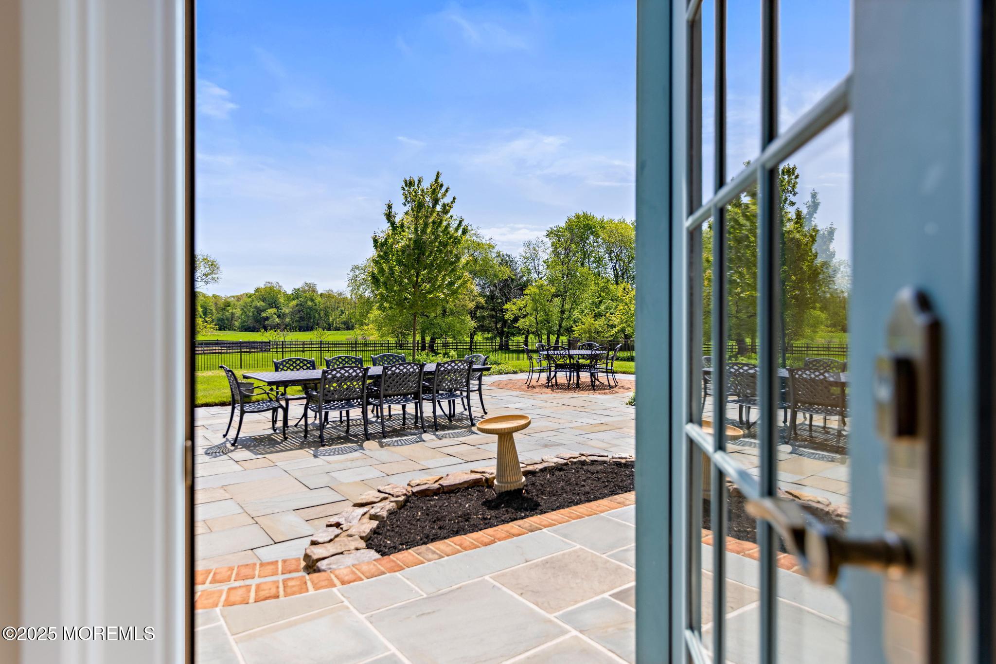 13 Driftwood Lane Colts Neck, NJ 07722 - Photo 18 of 88 a view from a balcony with chairs