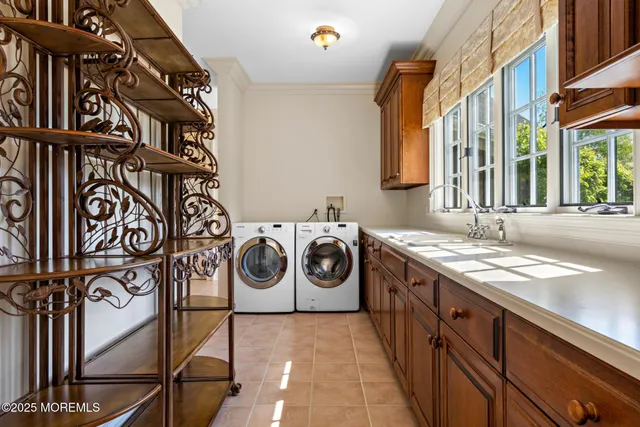a spacious bathroom with a granite countertop double vanity sink mirror and a