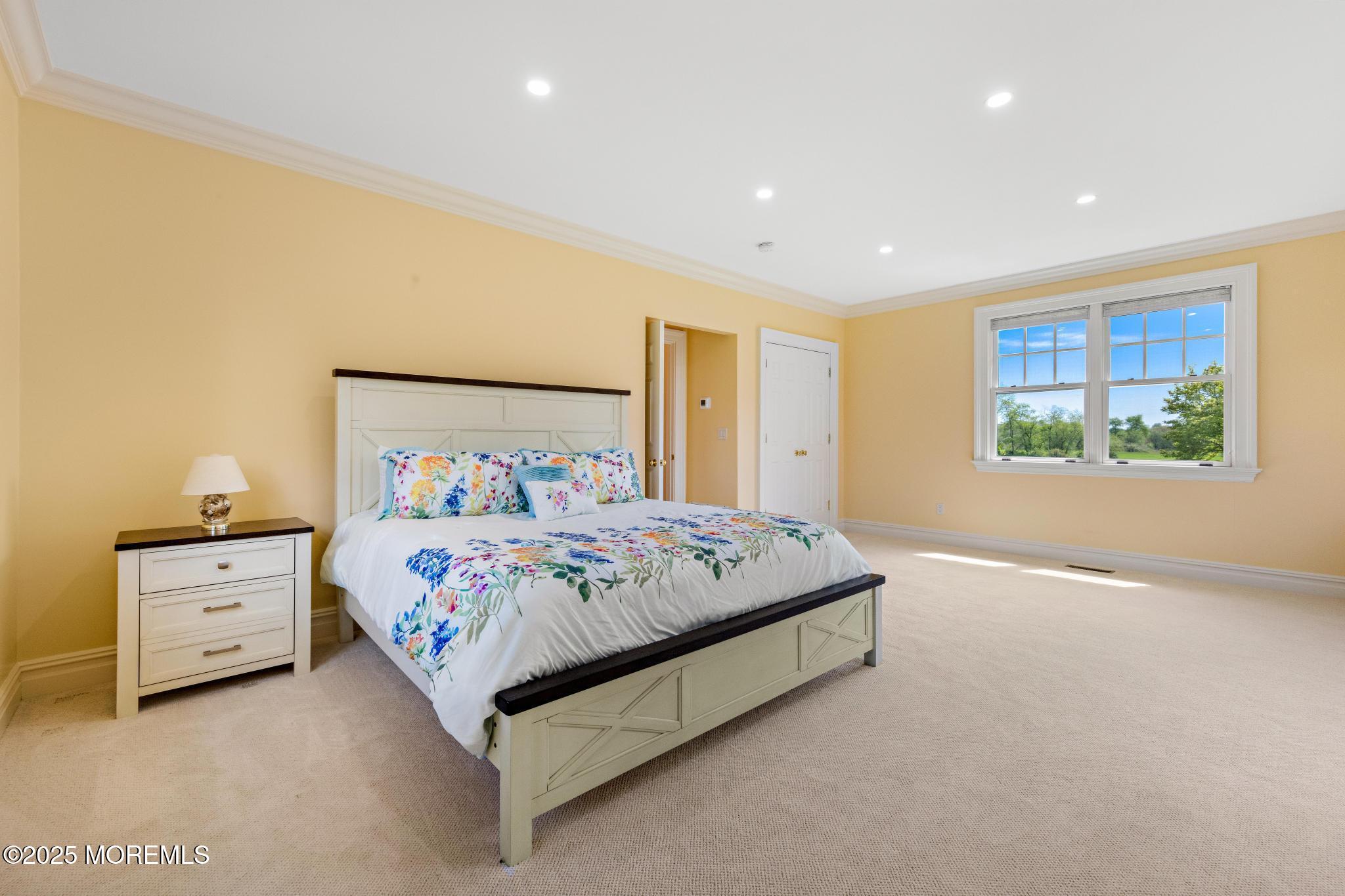 13 Driftwood Lane Colts Neck, NJ 07722 - Photo 28 of 88 a bedroom with a bed and window