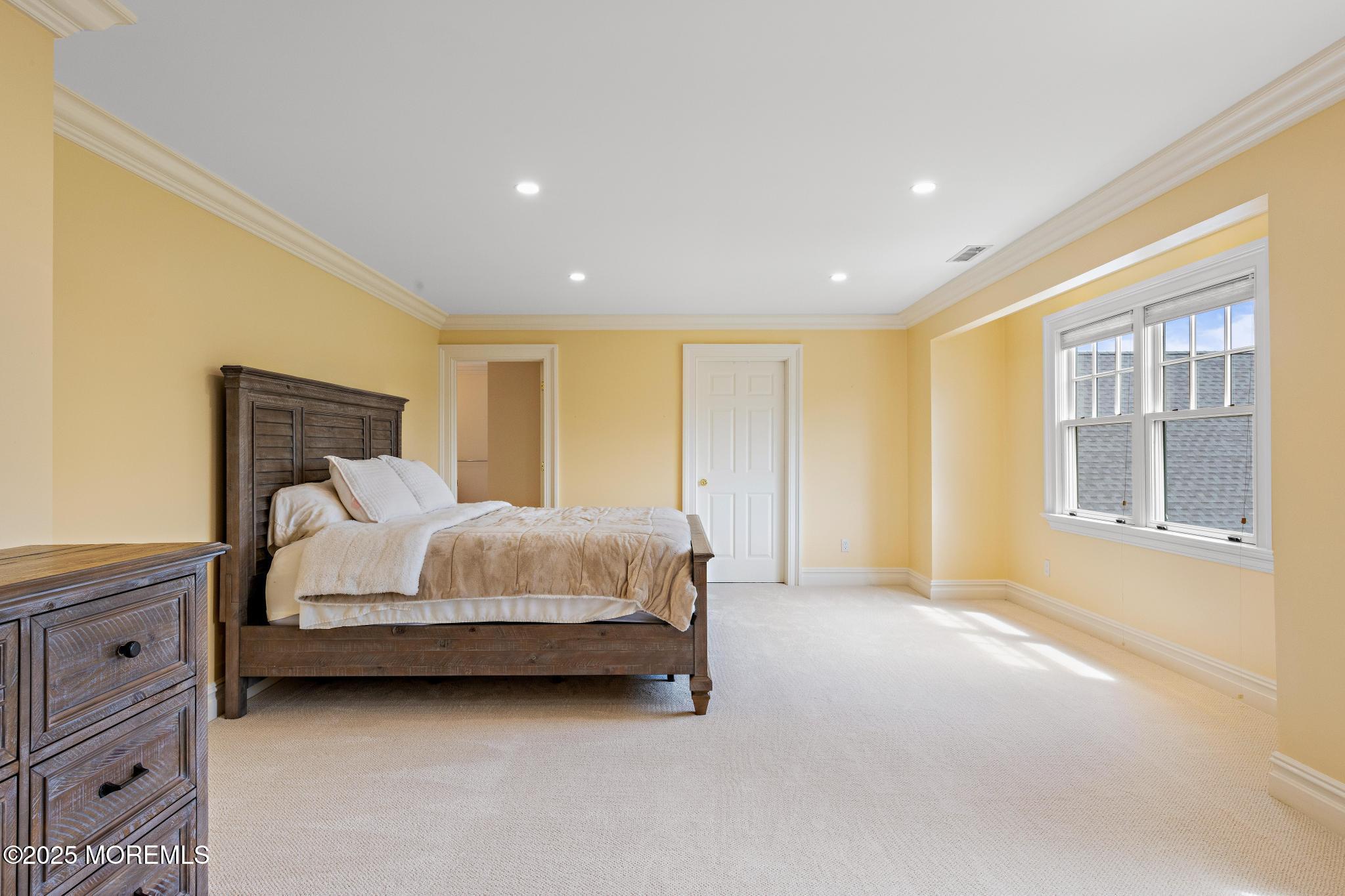 13 Driftwood Lane Colts Neck, NJ 07722 - Photo 36 of 88 a bed sitting in a spacious bedroom next to a window