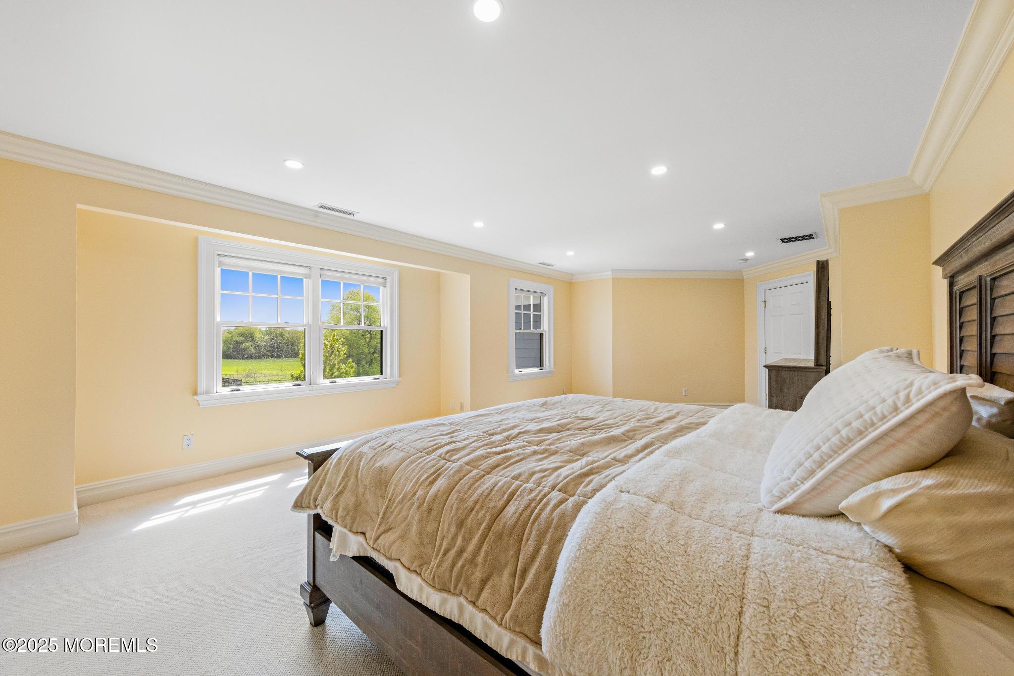 13 Driftwood Lane Colts Neck, NJ 07722 - Photo 38 of 88 a bed sitting in a spacious bedroom next to a window