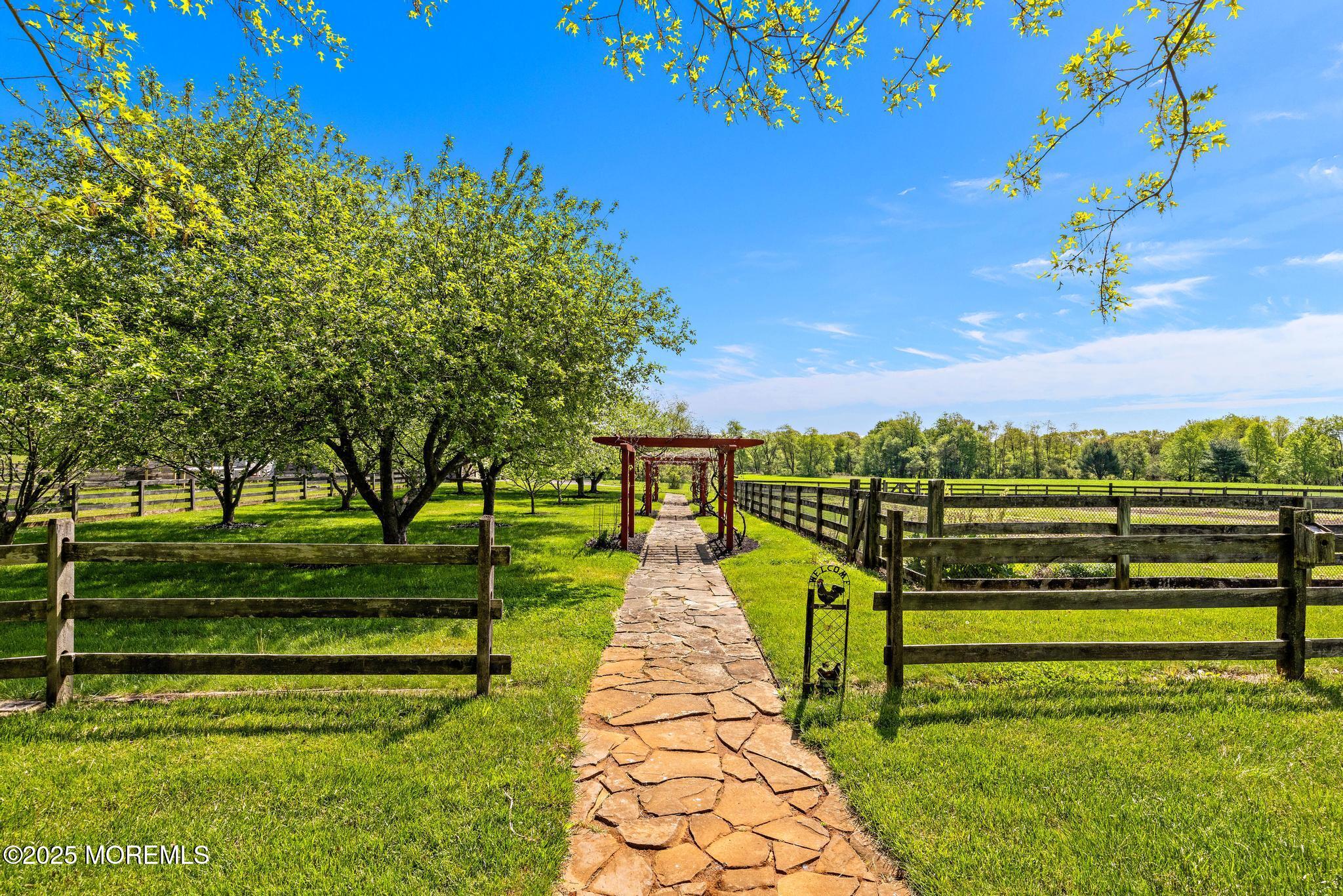 13 Driftwood Lane Colts Neck, NJ 07722 - Photo 60 of 88 a view of a garden with houses