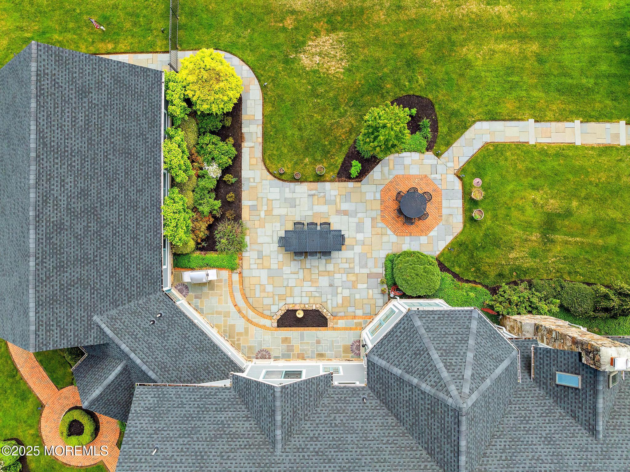 13 Driftwood Lane Colts Neck, NJ 07722 - Photo 84 of 88 an aerial view of a house with table and chairs
