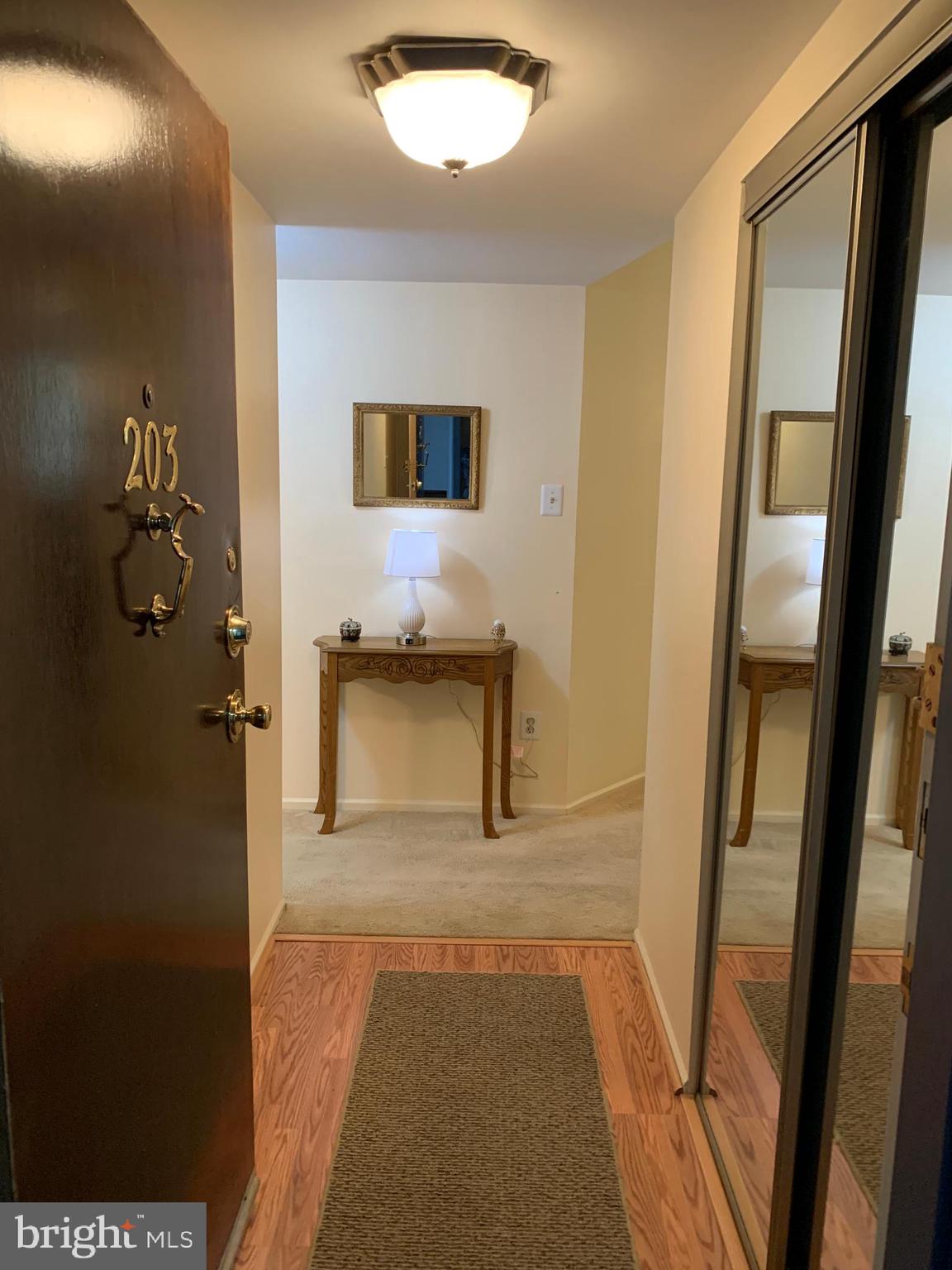 2131 Welsh Road, Unit 203 Philadelphia, PA 19115 - Photo 7 of 37 hall entrance to living area