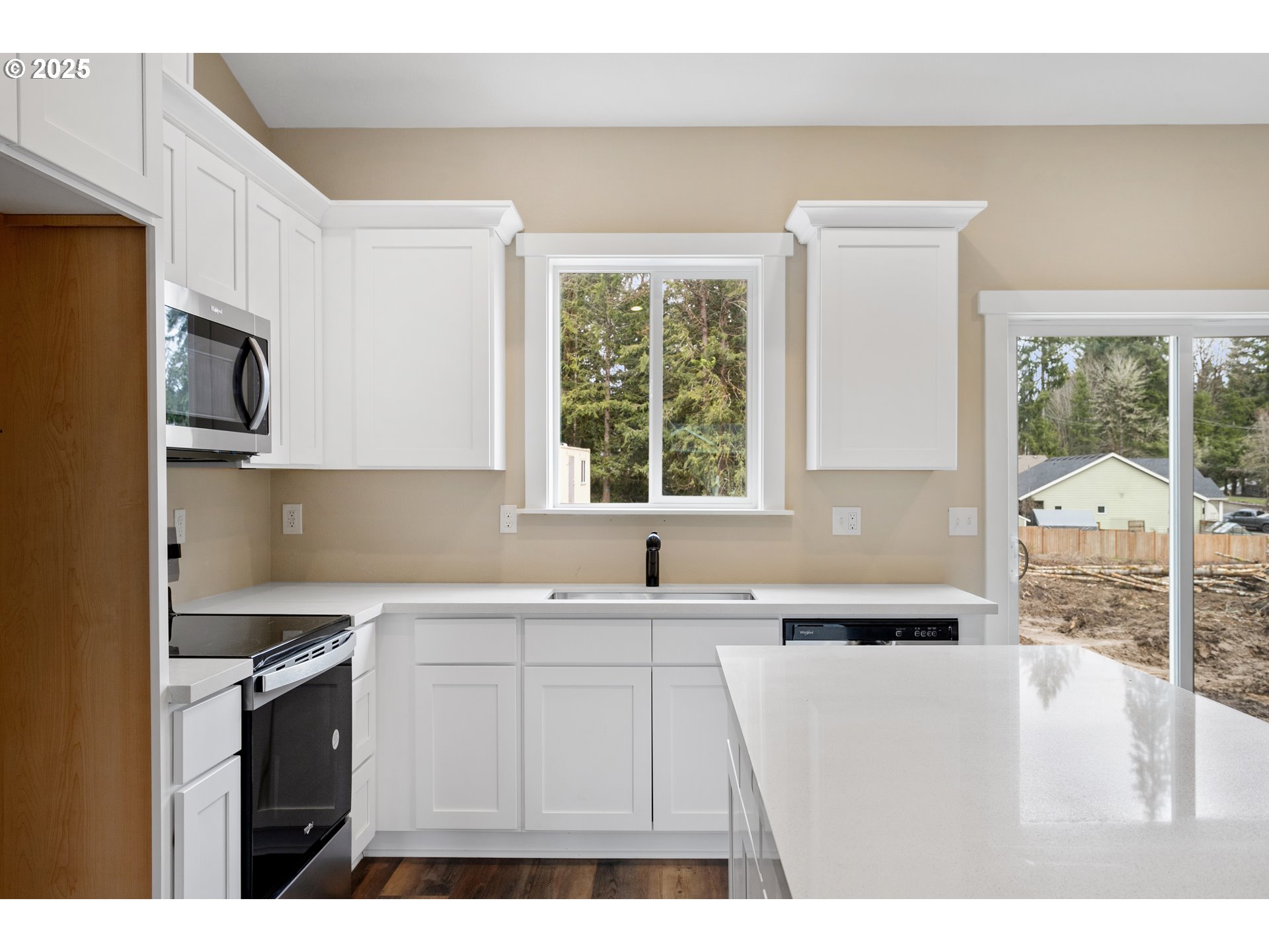 144 East H Street Vernonia, OR 97064 - Photo 9 of 35 a kitchen with a sink cabinets and window