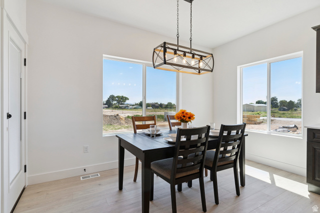 5777 West 4100 South Hooper, UT 84315 - Photo 6 of 41 Dining space with light wood finished floors and plenty of natural light